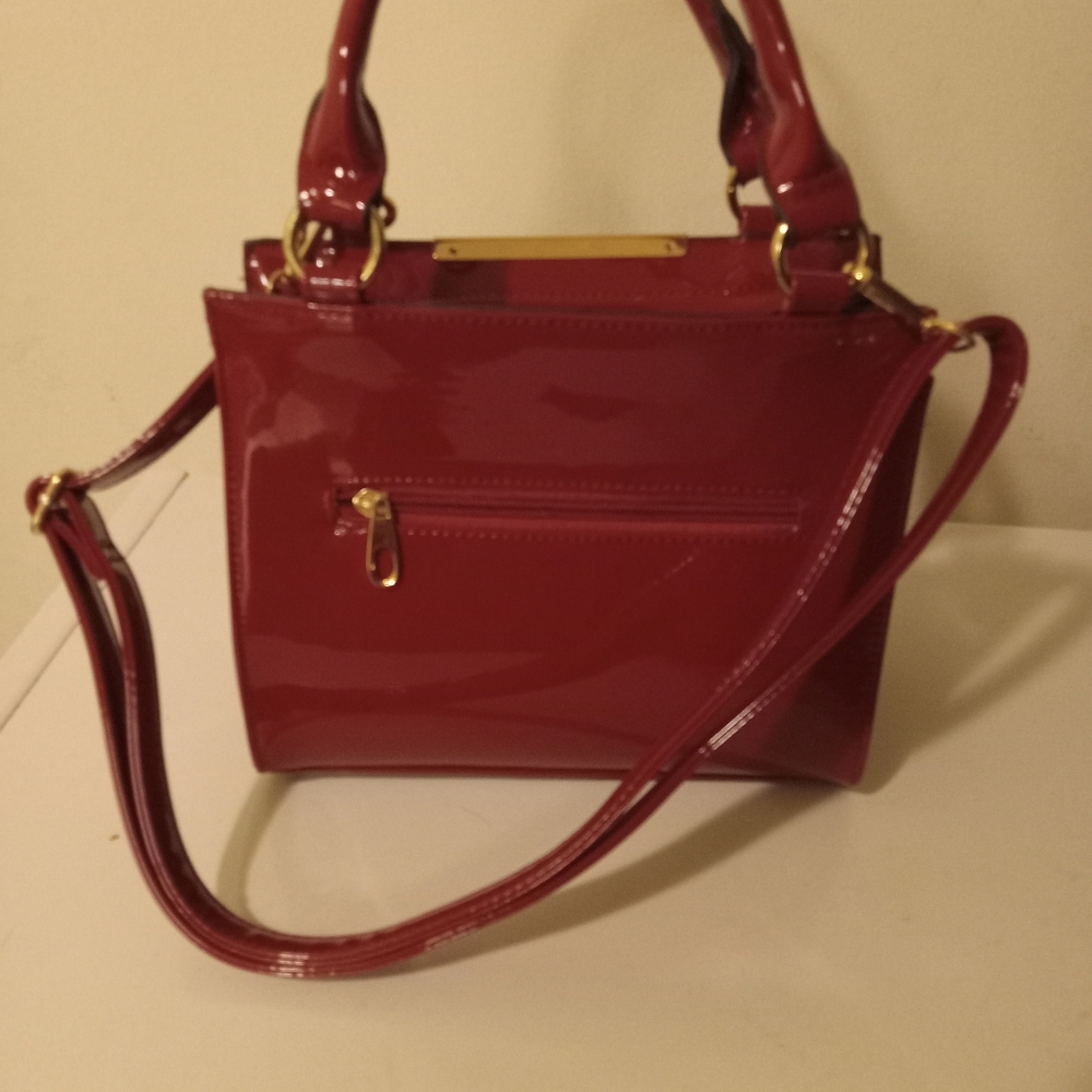 Red patin leather crossbows bag. Still in good condition. - Picture 5 of 5